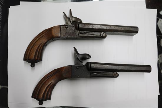 An Edwards flintlock pistol and two replicas